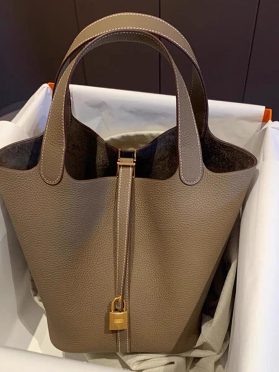 远洋真皮女包